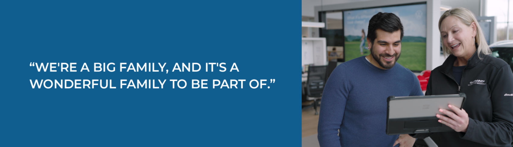Quote reads, “We're a big family, and it's a wonderful family to be part of.” Beside the quote, two people stand together in a showroom looking at a tablet and smiling.